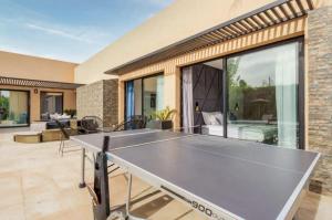 Stolní tenis v ubytování Villa Atlas piscine chauffee sans vis a vis nebo okolí
