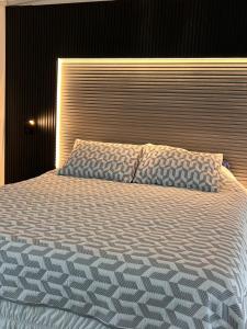 Ένα ή περισσότερα κρεβάτια σε δωμάτιο στο Casa Miraflores ARM