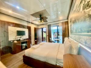 TV a/nebo společenská místnost v ubytování Champa Phan Boutique Hotel