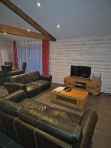 TV a/nebo společenská místnost v ubytování Maison sur le bassin d'Arcachon + 13 fotografií