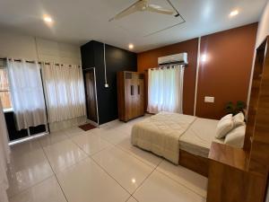 Ένα ή περισσότερα κρεβάτια σε δωμάτιο στο The Stellar By Stayzi