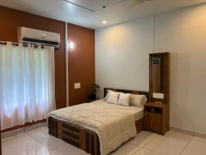 Ένα ή περισσότερα κρεβάτια σε δωμάτιο στο The Stellar By Stayzi