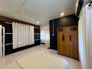 Ένα ή περισσότερα κρεβάτια σε δωμάτιο στο The Stellar By Stayzi