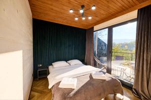 Postel nebo postele na pokoji v ubytování Blog House Resort + 228 fotografií