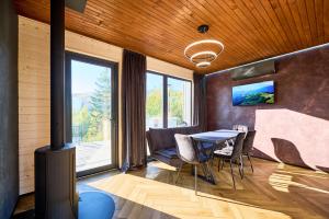 TV a/nebo společenská místnost v ubytování Blog House Resort