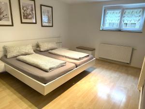 a bedroom with two beds in a room at Haus Alexandra in Rust