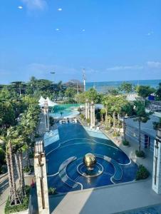 a view of a swimming pool at a resort at Large Sea View Room Quiet Side Copacabana in Ban Nong Pru +20 photos