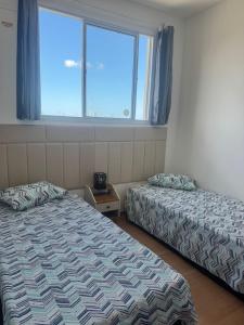 Postel nebo postele na pokoji v ubytování Reserva Almagre Apto 403