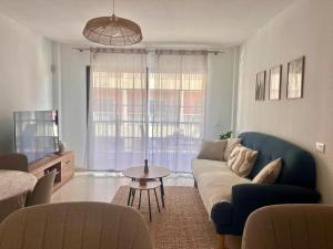 a living room with a couch and a table at La Esterlicia in Los Abrigos