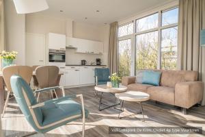 Kuchyň nebo kuchyňský kout v ubytování Vakantiepark De Krim Texel