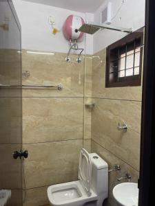 Koupelna v ubytování Rainbow apartments + 22 fotografií