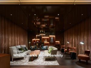 a lobby with couches and chairs in a building at Mitsui Garden Hotel Roppongi Tokyo Premier in Tokyo