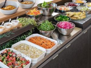 a buffet filled with lots of different types of food at Mitsui Garden Hotel Roppongi Tokyo Premier in Tokyo