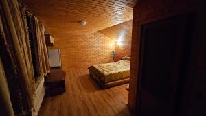 Ένα ή περισσότερα κρεβάτια σε δωμάτιο στο Sauna Cheremosh