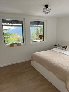 Postel nebo postele na pokoji v ubytování Appartement StPeter, 5 min met de auto van de skipistes