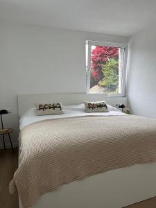 Giường trong phòng chung tại Appartement StPeter, 5 min met de auto van de skipistes