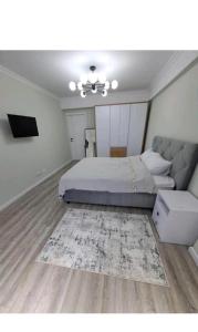 Ένα ή περισσότερα κρεβάτια σε δωμάτιο στο Sanmarko