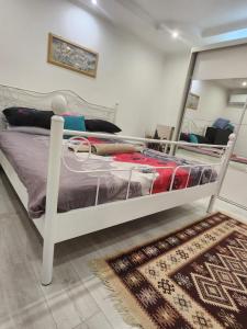 Ένα ή περισσότερα κρεβάτια σε δωμάτιο στο City Center Appartment