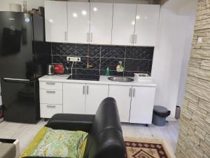 Η κουζίνα ή μικρή κουζίνα στο City Center Appartment