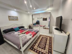 Μια τηλεόραση ή/και κέντρο ψυχαγωγίας στο City Center Appartment