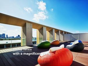 a rooftop terrace with a meditation room with a magnification view at Mitsui Garden Hotel Jingugaien Tokyo Premier in Tokyo