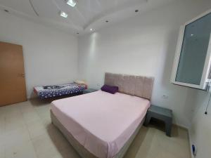 Postel nebo postele na pokoji v ubytování Rez-de-chaussée garage wifi 5Ggratuit gaz de ville