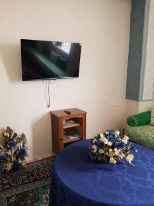 Μια τηλεόραση ή/και κέντρο ψυχαγωγίας στο Benaliem house