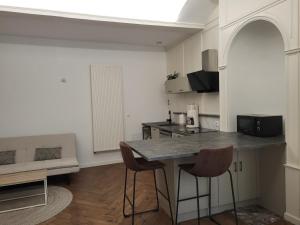 Kuchyň nebo kuchyňský kout v ubytování Le cocon particulier