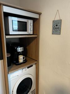 Kuchyň nebo kuchyňský kout v ubytování FeWo Seenland