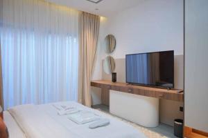 Ένα ή περισσότερα κρεβάτια σε δωμάτιο στο Velvet Residence