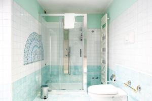 Koupelna v ubytování SWEETHOME ARENA VIEW - con parcheggio + 34 fotografií