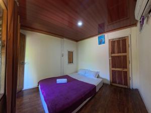 Postel nebo postele na pokoji v ubytování Lumera House + 29 fotografií