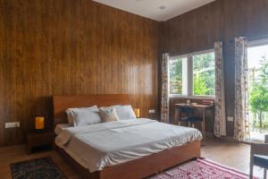 Ένα ή περισσότερα κρεβάτια σε δωμάτιο στο Villa Kaavan