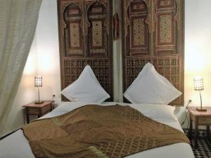 Postel nebo postele na pokoji v ubytování Riad La Clé De Fès