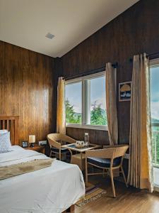 Ένα ή περισσότερα κρεβάτια σε δωμάτιο στο Villa Kaavan