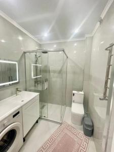 Ένα μπάνιο στο ЖК Керуен Сарай