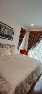 Ένα ή περισσότερα κρεβάτια σε δωμάτιο στο Al3eya Homestay