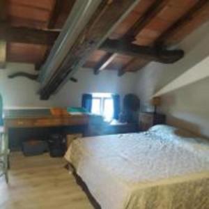 Postel nebo postele na pokoji v ubytování Ampia stanza nelle campagne parmensi