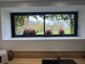 Κήπος έξω από το Gîte La Glycine