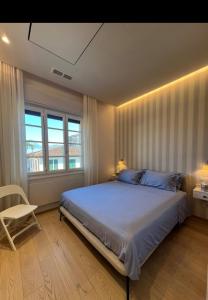 Ένα ή περισσότερα κρεβάτια σε δωμάτιο στο Forte Luxury Apartment