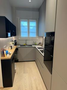 Η κουζίνα ή μικρή κουζίνα στο Forte Luxury Apartment