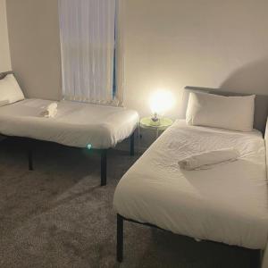 Postel nebo postele na pokoji v ubytování Pitchside House - sleeps 4