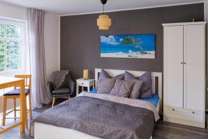 Ένα ή περισσότερα κρεβάτια σε δωμάτιο στο Gemütliches Apartment in Chemnitz Rabenstein