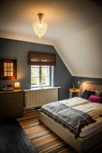 Ένα ή περισσότερα κρεβάτια σε δωμάτιο στο Landhaus Frank