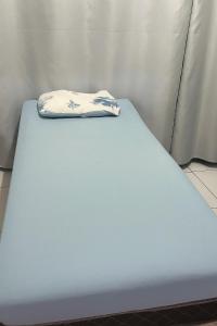 En eller flere senge i et værelse på Casa para 4 pessoas próximo ao Hangar