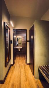 a bathroom with a sink and a mirror at Hidden Negombo By Sana's in Negombo