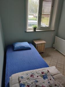 Postel nebo postele na pokoji v ubytování A whole house with 6 separate bedrooms