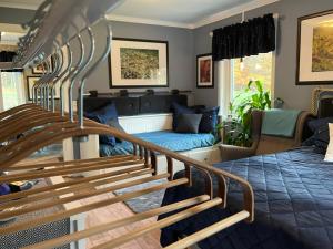 a room with a bed and a couch at Haere Mai B&B Orust in Henån