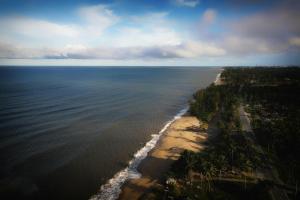 an aerial view of a beach and the ocean at Z Homestay in Kuala Terengganu