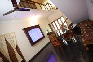 an overhead view of a living room with a window at Smiley Homestay in Varkala